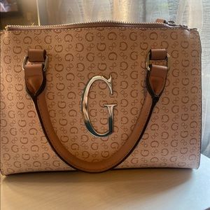 Guess pink logo handbag with cross body strap